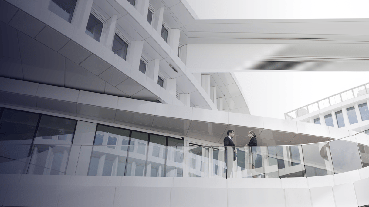 March_Poland, Warzawa, two businessmen under discussion By westend61_envato