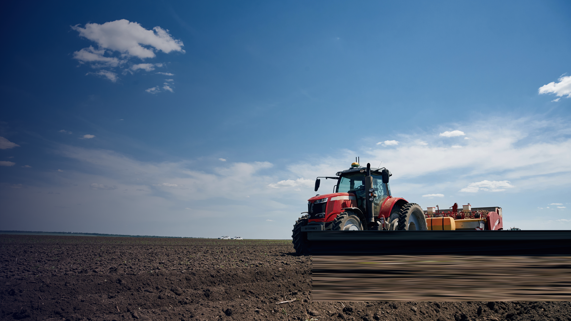 CNH_Driving on the field. Agricultural machinery, tractor. Conception of harvest By mstandret_envato