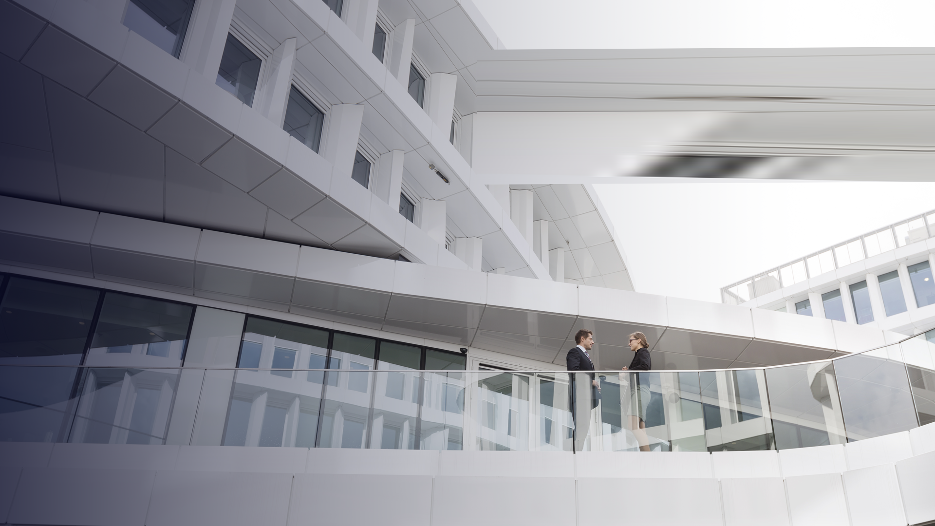 March_Poland, Warzawa, two businessmen under discussion By westend61_envato