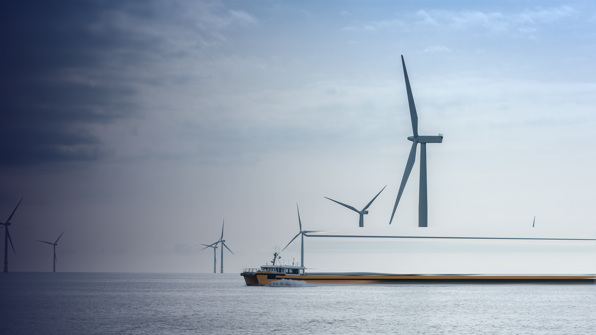 Otary_View of offshore windfarm and service boat By imagesourcecurated_2_envato